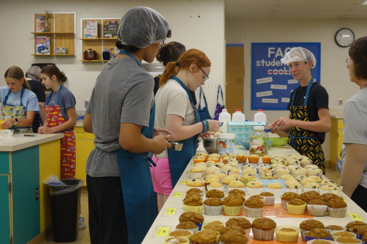 3rd hour FACS gets ingredients to make muffin batter on May 6th. Isaiah Sexton says preparing the muffins was not hard because “I am used to baking and Mrs. Harshbarger taught us well.”
