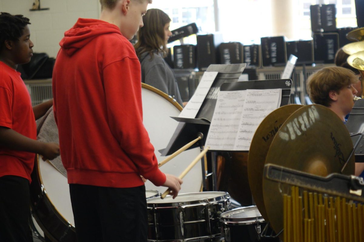 Eighth grader, Will Morrison, plays percussion during an advisory rehearsal held by Mrs. Lambotte on April 20th, Will says“I like percussion, because it's just like, my subject is pretty easy it's really laid back everyone's just kind of cool in it.” on April 29th

