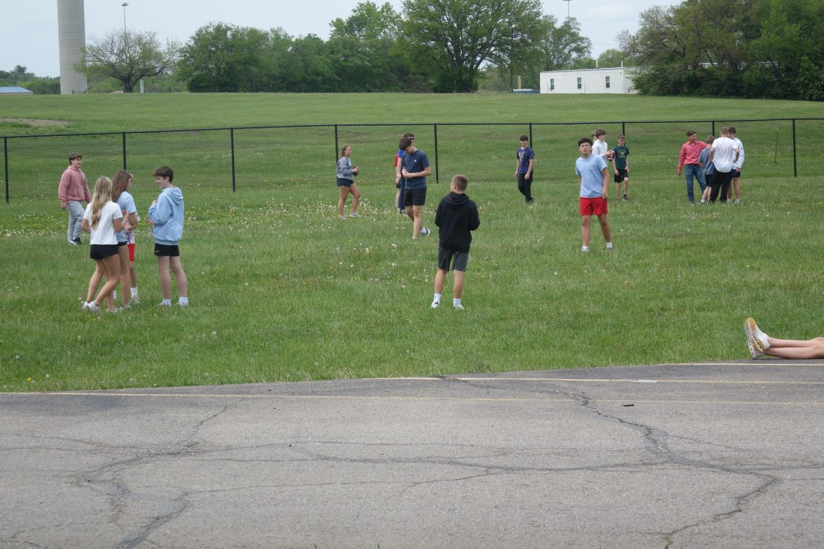 The HEAT team plays football and socializes outside in advisory on May 7th.
